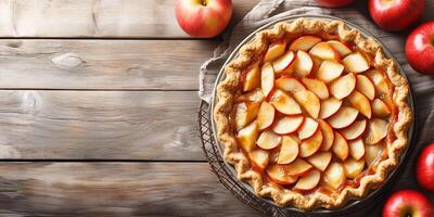 Pie with circular crust, filled with sliced apples, placed on cooling rack, food photography photo