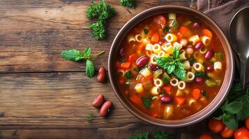 Bowl of minestrone soup with vegetables, pasta, and beans submerged in broth, meal photography photo