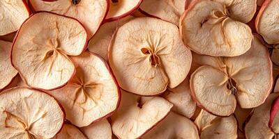 Handful of dried apple slices in a slightly irregular pattern, meal photography photo