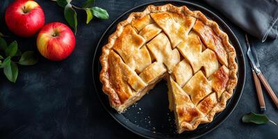 Pie cut open, revealing soft apple filling within a sturdy, baked crust, food setting photo