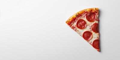 Single pepperoni slice centered on a clean surface, meal photography photo