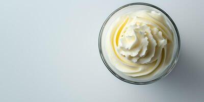 Single portion of mousse in a clear glass, with no visible toppings or decorations, food setting photo