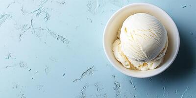Single scoop of vanilla ice cream in a small dish with smooth, even surface, meal photography photo