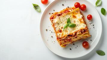 Slice of layered lasagna with pasta, cheese, and sauce, served with garlic bread, food setting photo