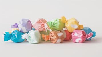 Taffy pieces stacked in a small pile, each displaying a unique color, on a plain white background, food photography photo