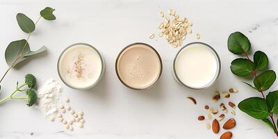 Three different plant-based milk brands displayed on a white background for product comparison, culinary photography photo