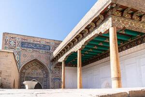 Samarkand, Uzbekistan-august 13, 2023-Particular of Shakhi Zinda necropolis, a famous mausoleum complex in Samarkand during a sunny day photo