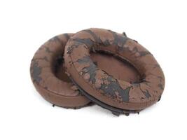 broken headphone pad from frequent use isolated on a white background photo