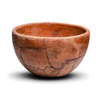 Rustic clay bowl with cracked texture on a white background, showcasing ancient craftsmanship and traditional pottery techniques, perfect for art and history themes. photo