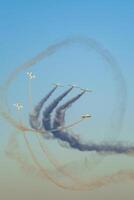 Stunt aerobatic planes performing stunts in air photo