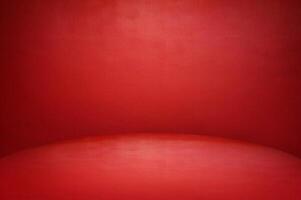 The floor and walls of the room are red as the background. photo
