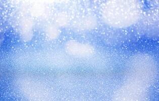 blue glitter background with bokeh. defocus background photo