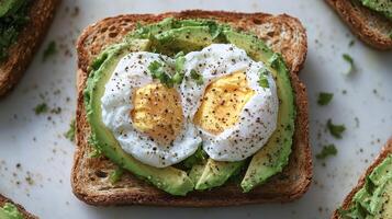 Deliciously crafted avocado toast topped with perfectly poached eggs enjoyed on a sunny morning at a cozy kitchen table photo