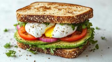 Delicious gourmet sandwich with fresh vegetables and poached eggs served on toasted whole grain bread for a healthy brunch option photo