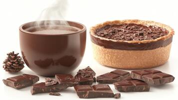 Warm chocolate drink and delicious pie with chocolate pieces on a white surface for a cozy winter treat experience photo