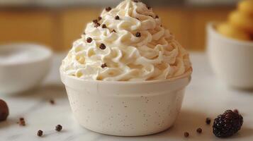 Delightful whipped cream topped with chocolate sprinkles served in a charming bowl on a marble countertop photo