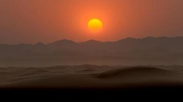 The sun sets over rolling sand dunes, painting the sky in vibrant orange and soft purple hues photo