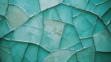Fragments of turquoise glass blend together, creating an abstract and colorful display of texture photo