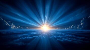 A breathtaking view of sunrise over calm waters, with radiant beams breaking through fluffy clouds photo