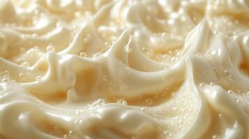 Whipped cream swirls with bubbles, adding rich flavor and creaminess to desserts photo