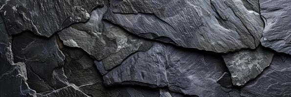 Dark Slate Stone Texture Background creates a rugged and natural vibe in design projects photo