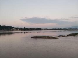 peace of riverside view in board city on sky background photo