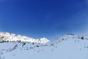 Tian Shan mountain system in Uzbekistan in winter on a Sunny clear day photo