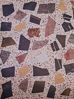 Terrazzo Tiles intricate details and nuances of intricate blend of natural stone aggregates embedded photo