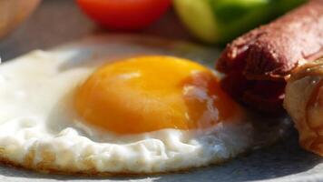 A delicious and appetizing breakfast plate featuring egg, sausage, and crispy spring rolls video