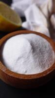 Baking soda and whole lemon on table video