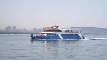 turkey istanbul 24 august 2024, Ferry Navigating Calm Waters with City Skyline in Background video