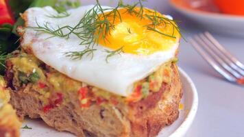 Savor delicious Avocado Toast with a Fried Egg, served with a Fresh Salad on the side video