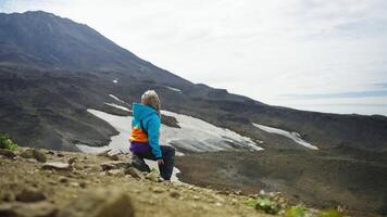 Halt On Mountain Slope, Relax And Meditation After Climbing, Female Tourist Sitting Alone video