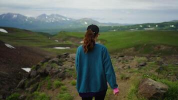 Enjoy Solitude In Mountains, Rear View Of Female Hiker Admiring Scenery From Top Of Mount video