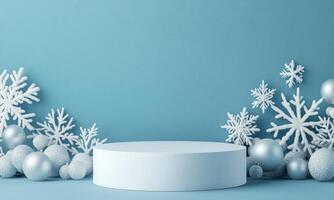 White round podium with white and silver baubles around. Soft blue background with snowflakes and glitter. Festive minimalistic winter background. photo