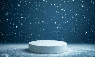 White round podium with snow falling around. Dark blue background with snowflakes and glitter. Festive minimalistic winter background. photo