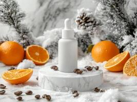 White cosmetic serum bottle on white podium surrounded with snow, oranges, orange peels, coffee beans on marble table. Minimalistic photo style.