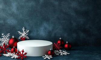 White round podium with red Christmas baubles on dark blue background, snowflakes and glitter around. Festive minimalistic winter background. photo