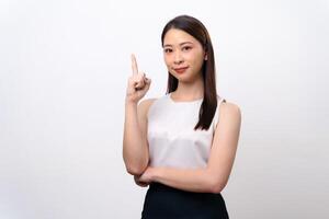 A woman is pointing to the sky with her finger photo