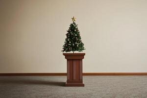 A small decorated Christmas tree on a wooden pedestal in a room with beige walls photo