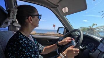 Driving Along the Coastline on a Sunny Day With Ocean Views and Clear Skies video