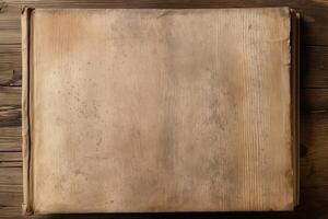 Antique blank open book on a wooden background photo