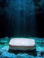 Mysterious underwater cave with glowing rock formation photo