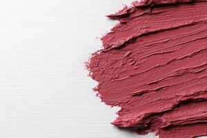 Textured red lipstick makeup background photo