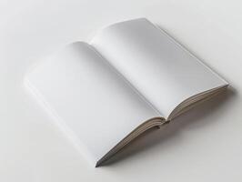 open book with blank pages on a plain white background photo