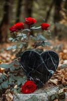 Broken heart and red roses photo