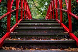 Vibrant Red Bridge in Lush Forest photo