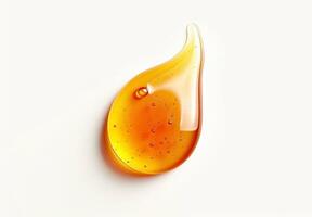 Amber liquid droplet with bubbles photo
