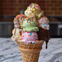 Colorful Assortment of Ice Cream Scoops in a Waffle Cone photo