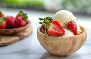 Fresh strawberries and vanilla ice cream in a wooden bowl photo